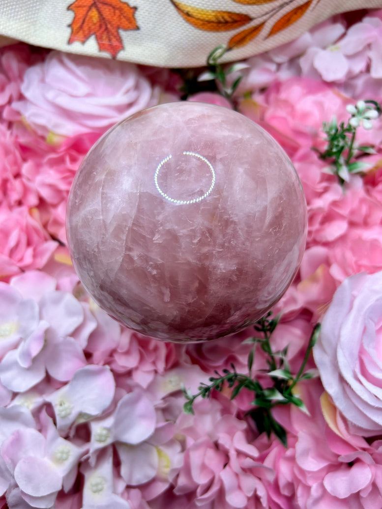 High Quality Rose Quartz Sphere on rotating stand 1.6kg 10cm tall