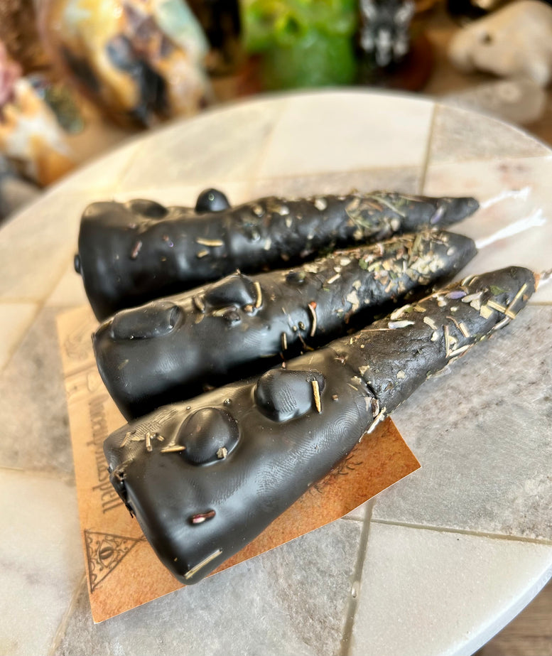 Hand rolled protection spell candles made with beeswax, herbs, essential oils and tourmaline crystal chips
