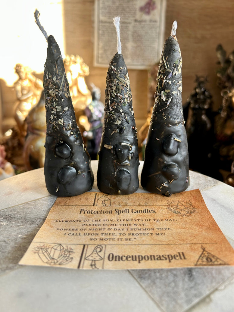 Hand rolled protection spell candles made with beeswax, herbs, essential oils and tourmaline crystal chips