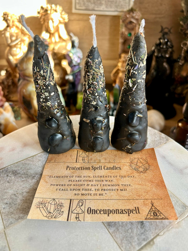 Hand rolled protection spell candles made with beeswax, herbs, essential oils and tourmaline crystal chips