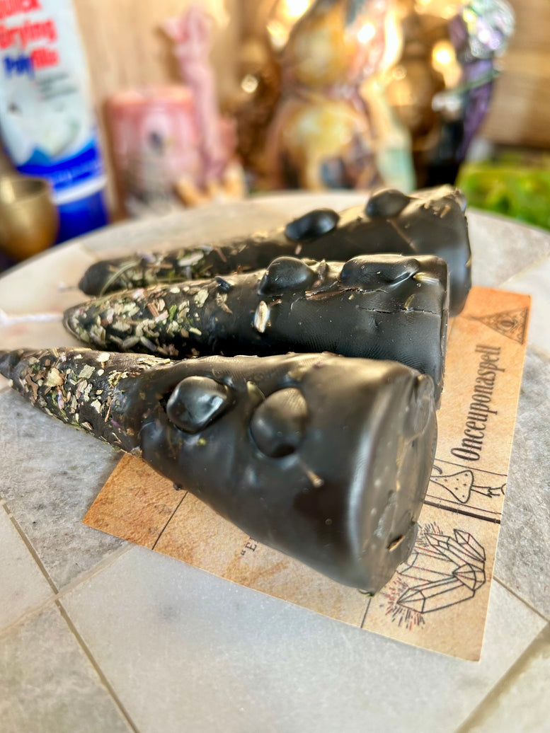 Hand rolled protection spell candles made with beeswax, herbs, essential oils and tourmaline crystal chips