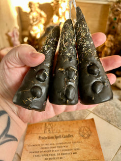 Hand rolled protection spell candles made with beeswax, herbs, essential oils and tourmaline crystal chips