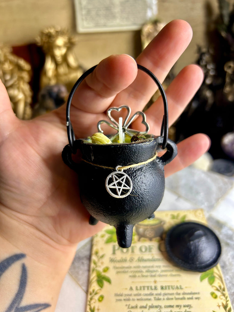 Pot of cold cast iron cauldron wealth and abundance spell candle